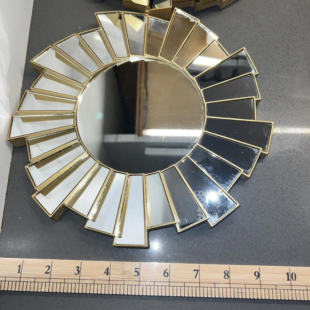 Three Gold Style Plastic Sunburst Wall Hanging Accent Mirrors.